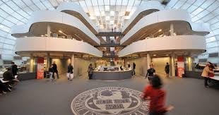 Interior of the Guggenheim Museum showing its distinctive spiral architecture with circular galleries and skylight above